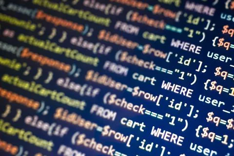 Structured sql code on monitor. SQL code on a dark background development Foto stock