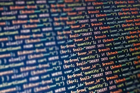 Structured sql code on monitor. SQL code on a dark background development 스톡 사진
