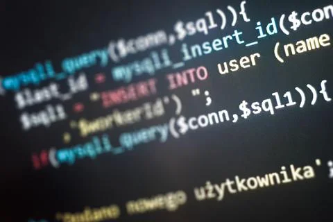 Structured sql code on monitor. SQL code on a dark background development 스톡 사진