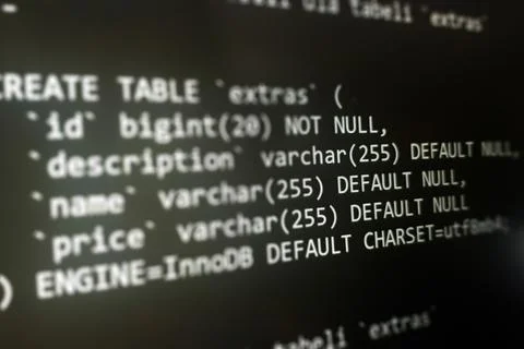 Structured sql code on monitor. SQL code on a dark background development Stock Photos