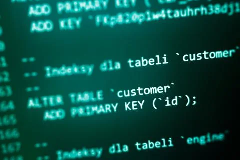 Structured sql code on monitor. SQL code on a dark background development Stock Photos