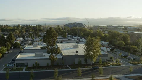 Structures And Cars On In Google And Nasa Campus Against Sky - Mountain View, Stock Footage 163791563