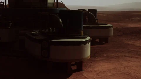 Structures on a red planet with a dusty surface and distant mountains Stock Footage 343514461