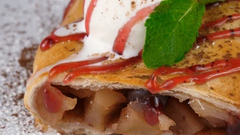 Strudel apple, close-up view, served in Restaurant, loop Stock Footage 95346437