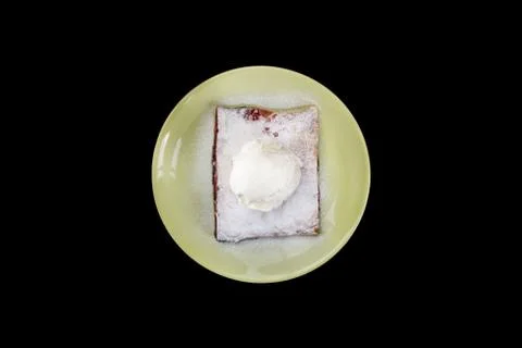 Strudel with cherry , served on the ceramic plate with the ice cream. Stock Photos