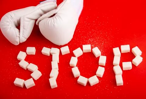 The struggle with the sugar,stop the consumption of sweets Stockfoto's