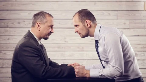 The struggle of views and emotions of two businessmen Stock Footage 99419584