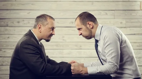 The struggle of views and emotions of two businessmen Stock Footage 99420286