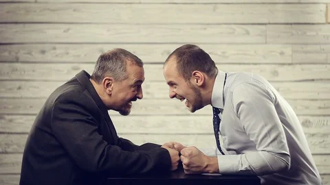 The struggle of views and emotions of two aggressive businessmen Stock Footage 99420736