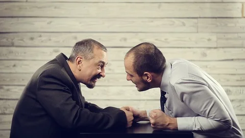The struggle of views and emotions of two aggressive businessmen Stock Footage 99420956