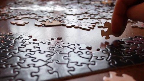 Struggling to figure out complex large puzzle Stock Footage 71965002
