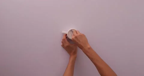 Struggling taking off a sticker 1 스톡 동영상 132210670