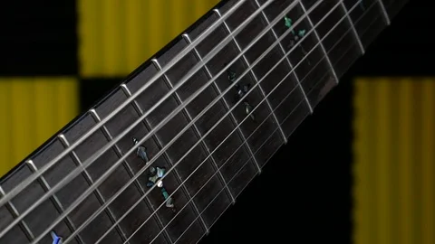 Strum 9 String Guitar Close Up On Strings Vibrating Video stock 96881014