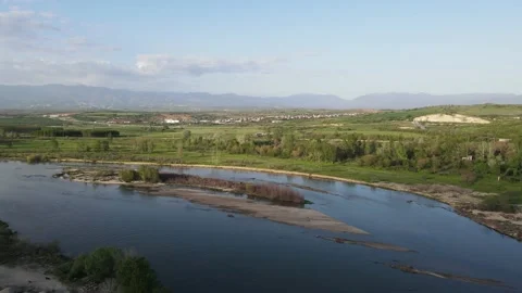 Struma river passing through the Petrich valley, Bulgaria Stock Footage 185970998