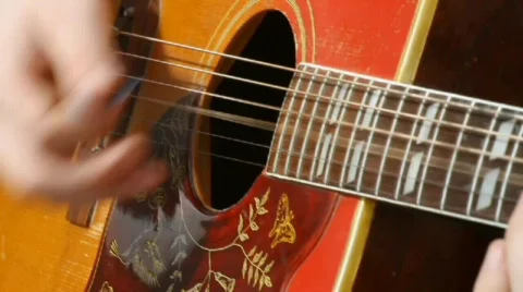 Struming a Guitar Stock Footage 668407