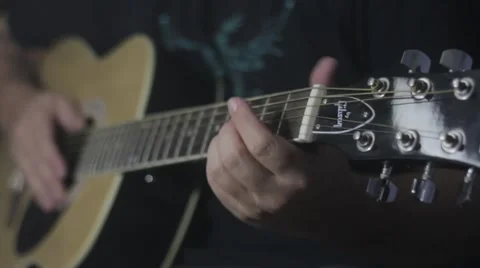 Strumming acoustic guitar Stock-Footage 47755900