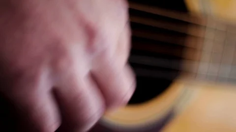Strumming the Guitar Stock Footage 102575052