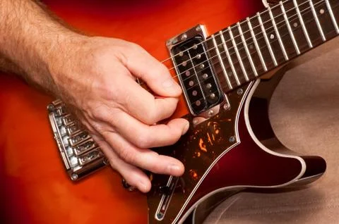 Strumming Stock Photos