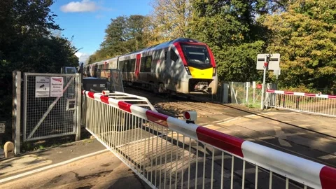 Strumpshaws new automatic train crossing replacing the old manual wooden gates 動画素材 141674436
