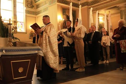 Stryi, Ukraine - September 11, 2022: Priest conducting baptism ceremony in .. Stock Photos