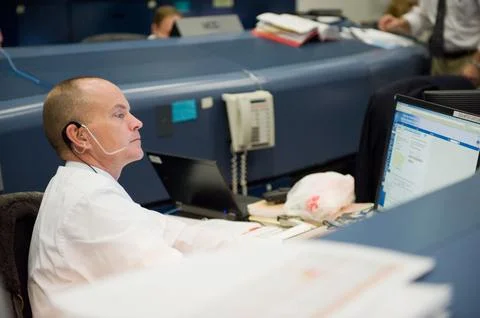 STS-130 ascent flight controllers on console in WFCR with Flight Director N.. Stock Photos