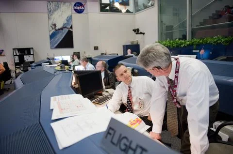 STS-130 ascent flight controllers on console in WFCR with Flight Director N.. Stock Photos