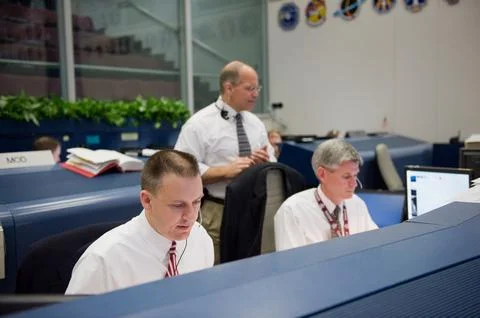 STS-130 ascent flight controllers on console in WFCR with Flight Director N.. Stock Photos