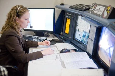 STS-130 ascent flight controllers on console in WFCR with Flight Director N.. Stock Photos