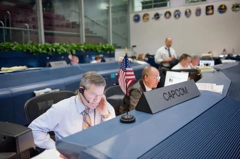 STS-130 ascent flight controllers on console in WFCR with Flight Director N.. Stock Photos