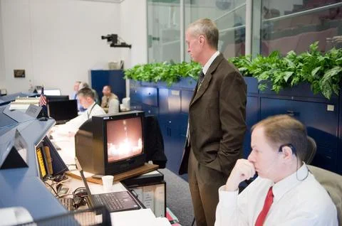 STS-130 ascent flight controllers on console in WFCR with Flight Director N.. Stock Photos