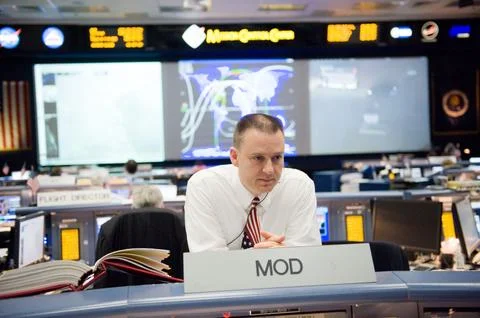 STS-130 ascent flight controllers on console in WFCR with Flight Director N.. Stock Photos