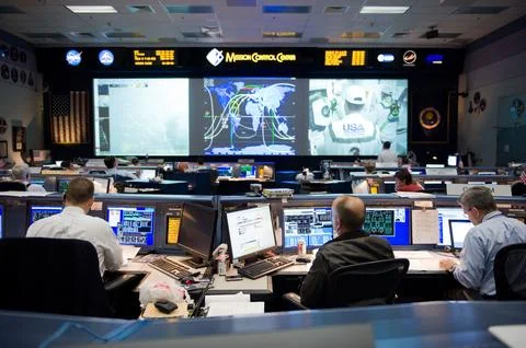 STS-130 ascent flight controllers on console in WFCR with Flight Director N.. Stock Photos