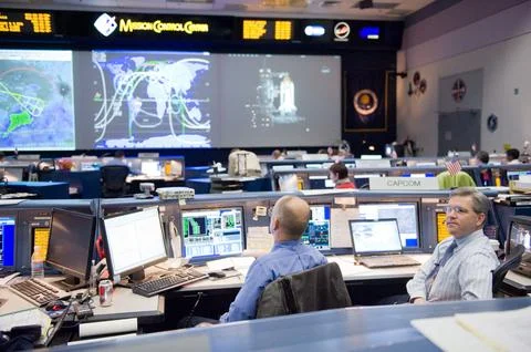 STS-130 ascent flight controllers on console in WFCR with Flight Director N.. Stock Photos