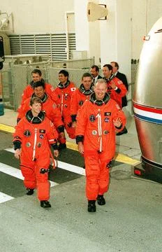 The STS-92 crew exits the Operations and Checkout Building on their way to... Foto stock
