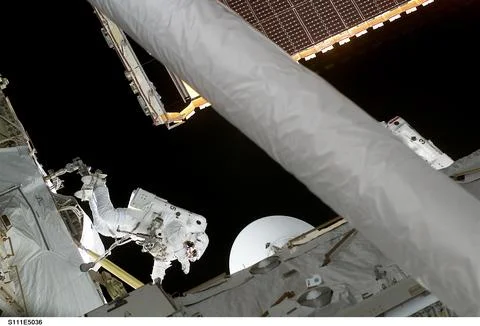 STS111-E-5036 (8 June 2002) --- Astronauts Philippe Perrin (left center) an.. 스톡 사진