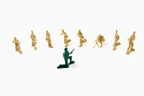 Stubborn concept - plastic army men Stock Photos