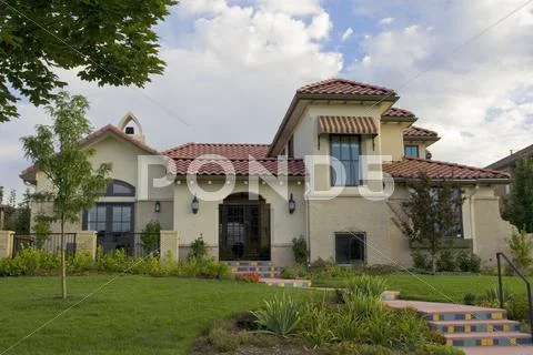 Stucco House with Red Roof Stock Photos
