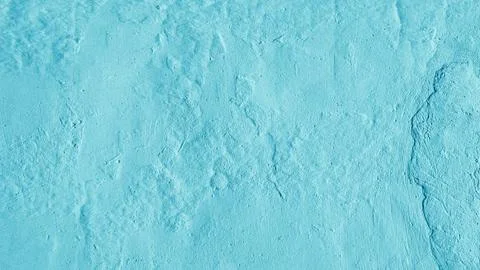 Stucco plaster wall background texture of cyan painted cement, concrete wall Foto stock