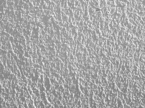 Stucco relief grey wall image. Relief texture Stock Photos