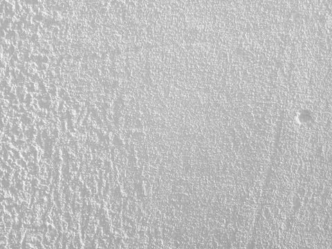 Stucco relief grey wall image. Relief texture Stock Photos