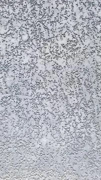 Stucco wall background texture with rough plaster and gradient Stock Photos