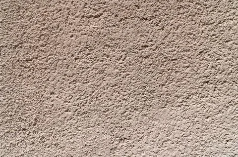 Stucco wall showing rough texture on exterior surface 写真素材