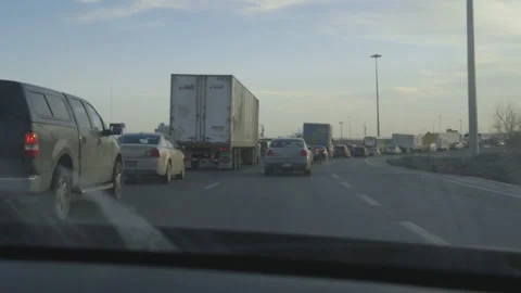 Stuck in Traffic on the Highway during a Winter Morning Stock Footage 147692189