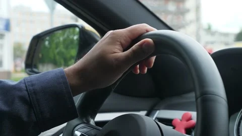 Stuck in a traffic jam steering wheel closeup Video stock 154899661