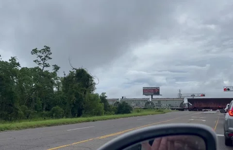 Stuck at train tracks by train. Stock Footage 205441637
