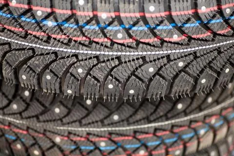 Studded tire on a background close-up Stock Photos