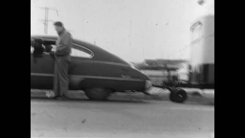 Studebaker Pulling Camper Trailer 1950 Stock Footage 152920138