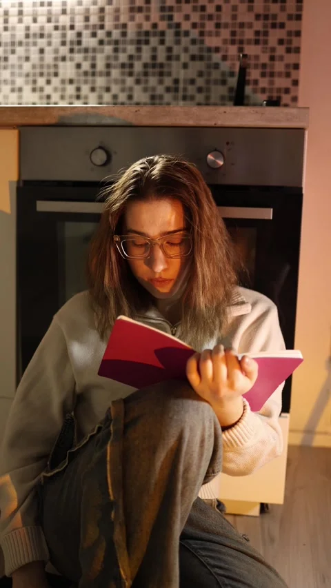 Student with ADHD distracted by phone while studying Video stock 334057042