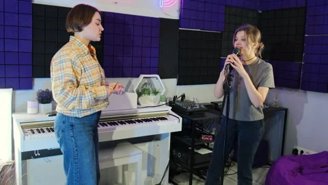 Student and instructor strive for excellence in singing Stock Footage 307024313