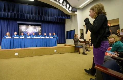 A student ask a question to NASA Astronaut Joe Acaba, center, and NASA s 2... Stock Photos